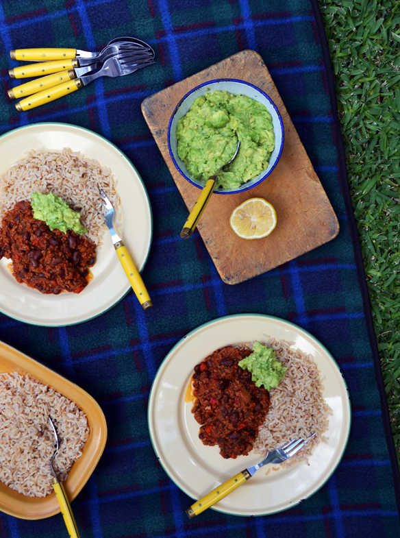 Chilli con carne with smashed avocado. One Equals Two.